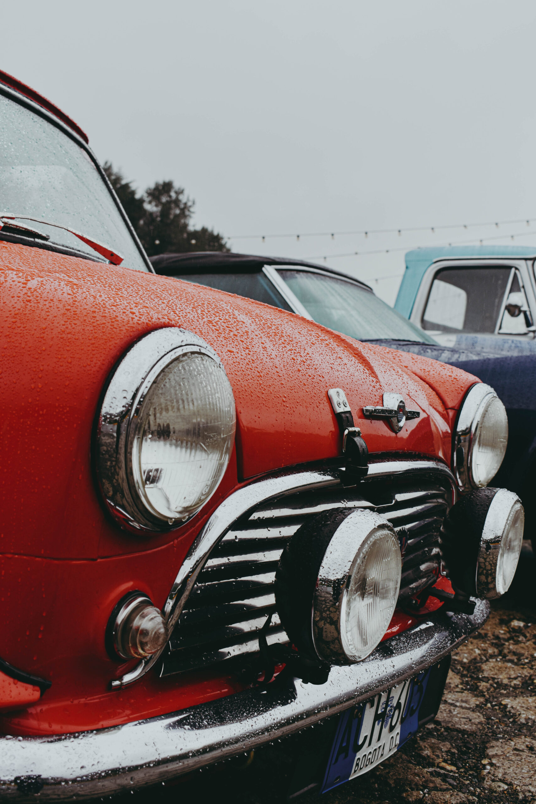 Classic Mini cord shot by Salo Martínez, highlighting the elegant chrome grille and timeless luxury automotive design."